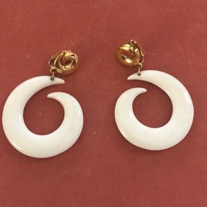 Groovy white dangle clip earrings